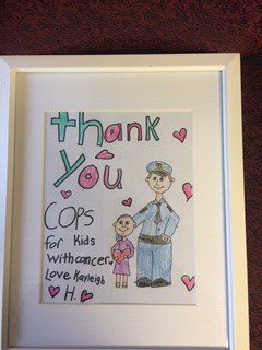 Kayleigh H . Is one of  our Cfkwc kids, she drew this picture for all if us at Cfkwc, as a Thank you for the donation we made to her and her family.
