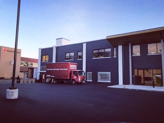 BigBroBigSisIND's tweet photo. Yesterday was an exciting day at the new office as our furniture was delivered and some exterior signage went up. Just a couple weeks left until the big move! 💚 https://t.co/g2etEe39Yj