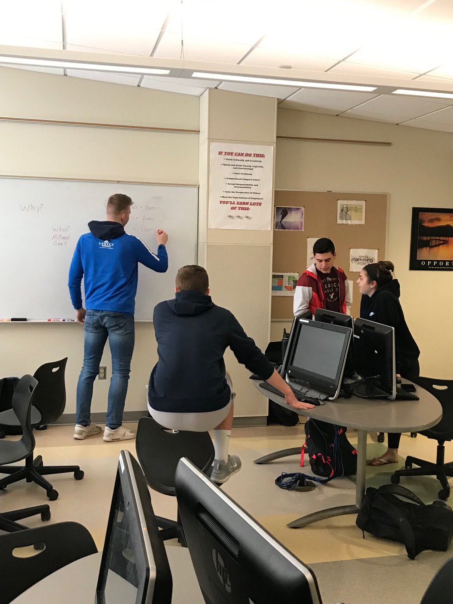 One group’s business plan collaboration/brainstorming in action during Entrepreneurship class.  Gearing up for group pitches later next week!  #ghscommunity
