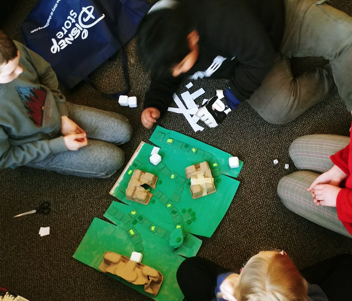TheRealMrD4's tweet photo. We took over the library today to beta test our cooperative boardgame designs with the grade 6's. #lockespride https://t.co/aRFABfSp79