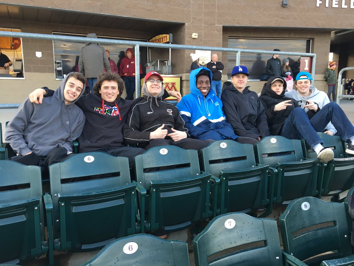 Great group of boys! Dealing with the chill to watch Saints baseball.