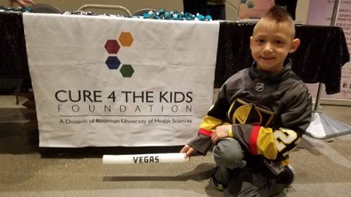 Cure4thekids's tweet photo. What an amazing Knight! Thank you Vegas Wish for getting Colin to the game yesterday. He had a blast! Also, huge thank you to @VGKHatGirlLogan for jumping in for a quick pic with Colin! #GoKnightsGo #VegasBorn #GoldenKnights https://t.co/knHG47qAjy