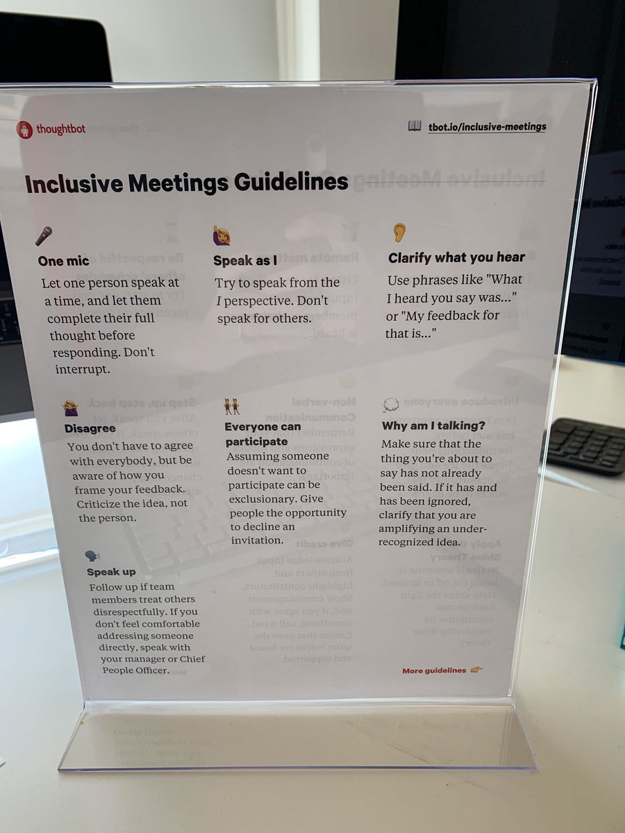 Inclusive meeting guidelines print out on a conference room table