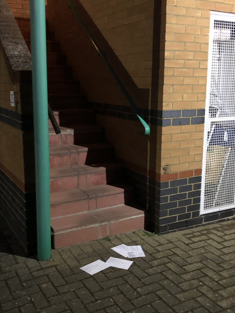 colin27ward's tweet photo. @camcitco Is this an acceptable place to leave our flats’ poll cards for the local elections? I’m guessing “delivered” by a volunteer without the energy to climb the stairs and put through the doors #identityfraud #notimpressed https://t.co/kpyKmCuU0T