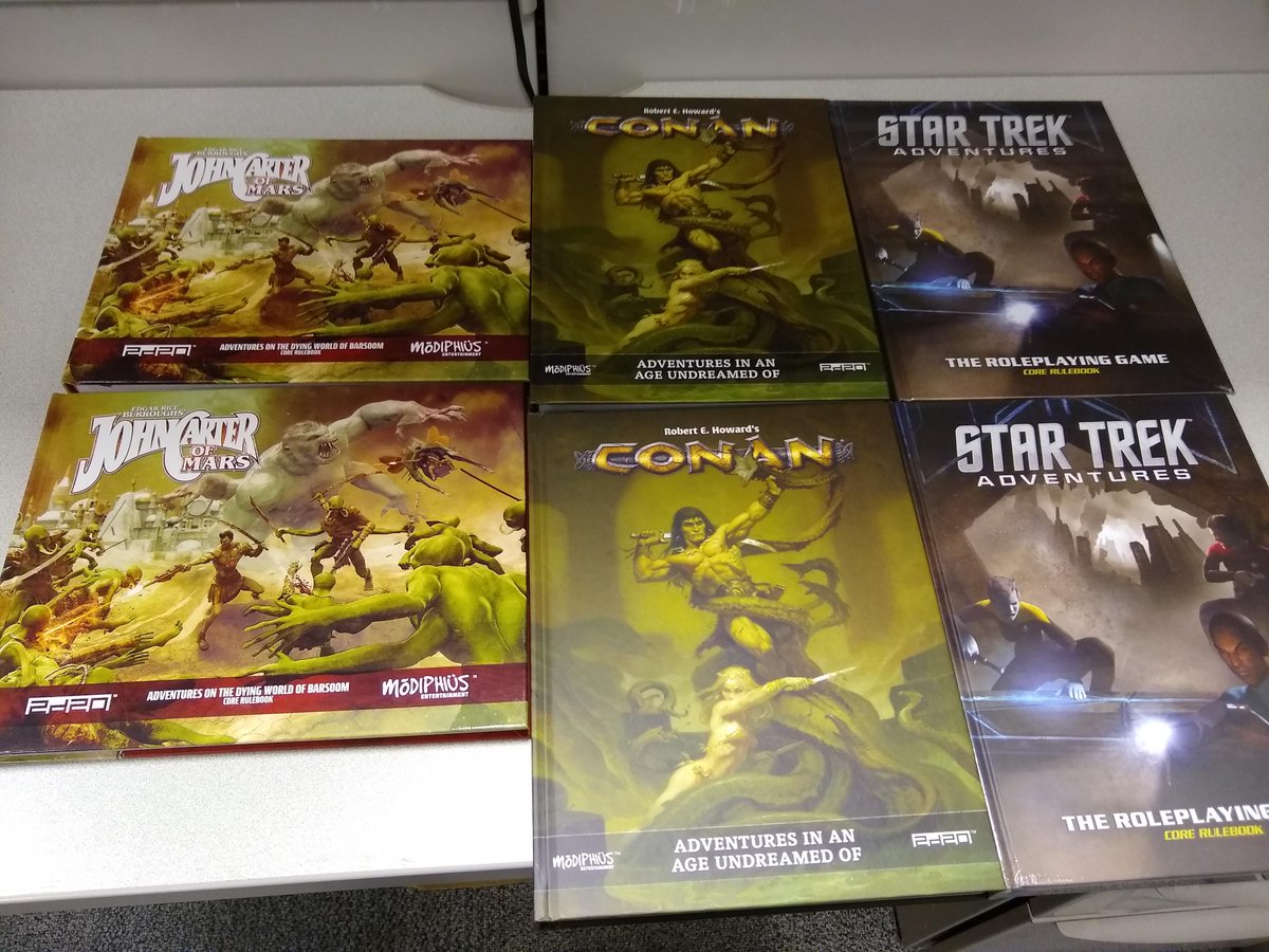 Folks the Modiphius give-aways for our <a href="/Calgaryexpo/">CALGARY EXPO</a> Expo 2019 2d20 Demo Team have just arrived!
Many thanks to <a href="/RPGWebby/">Samantha Webb</a> <a href="/Modiphius/">Modiphius</a> for sending us these beautiful core books for Conan, Star Trek Adventures and John Carter of Mars!!
We'll post the schedule as soon as we get it!