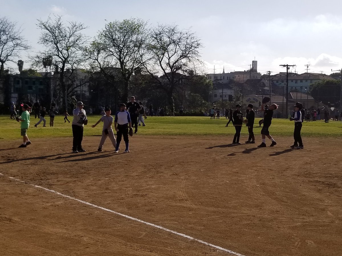 Playing ball with our #EchoPark Community @LAPDRampart @cmgilcedillo and @jvillafigs El Centro Del Pueblo, #CommunityEngagement at its best. @LAPDHQ @MitchOFarrell @LAPDChiefMoore