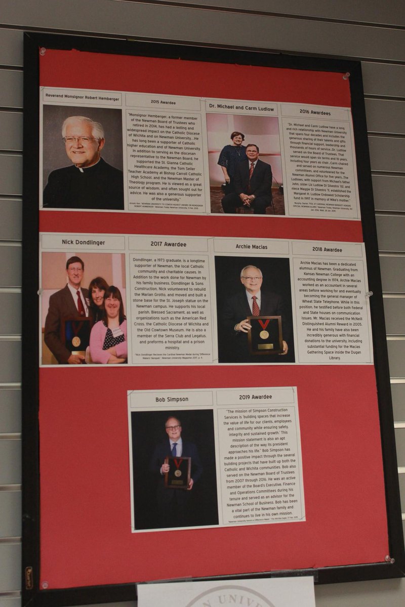 NewmanU's tweet image. Student Michael VanDeest took on the massive project of researching all past Cardinal Newman Medal awardees. His work is on display in the Heritage Room and Archives in Sacred Heart. #NewmanU #History #Archives #Project
