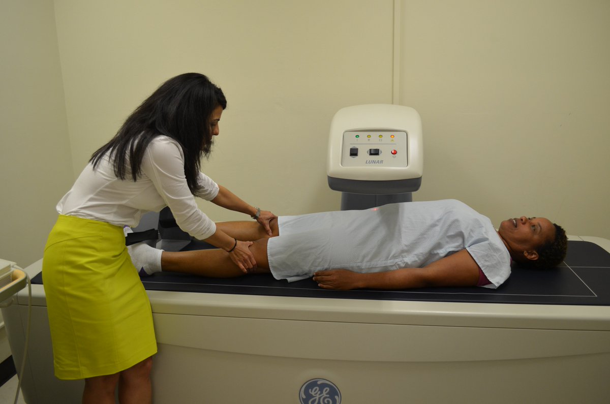 Dr. Shirin Hooshmand scanning the bone mineral density of a fellow using a dual-energy X-ray absorptiometry scanner @SDSUENS.