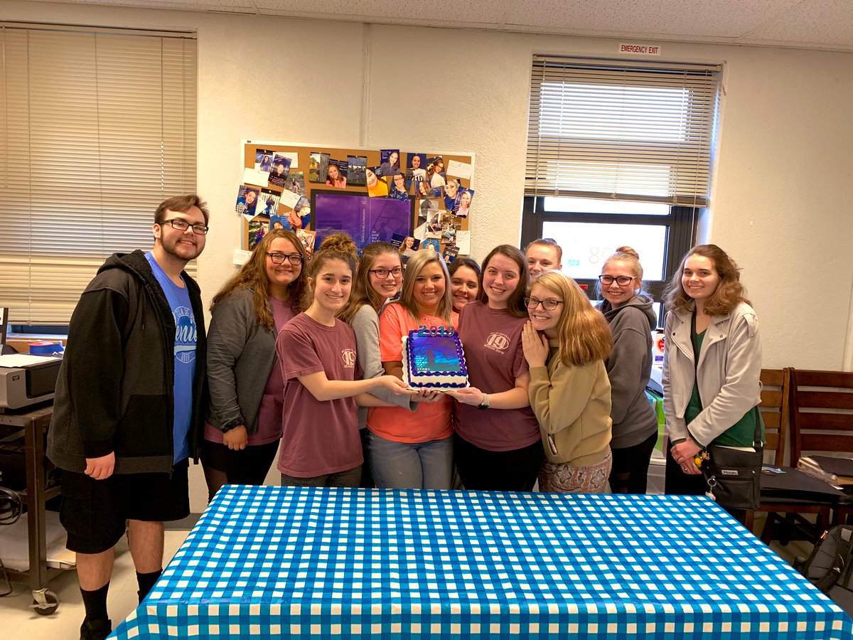 MsASchmied's tweet photo. Our Yearbook seniors said goodbye to their final book with a celebratory cake! We’ll miss you! #liontrac @MrsP208 https://t.co/gTyQ86b8Ow