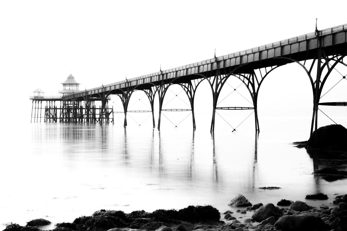 I love Black and white photography. Clevedon Pier again but this time with highlights blown and in B&W. #blackandwhitephotography #clevedonpier #longexposure #appicoftheweek