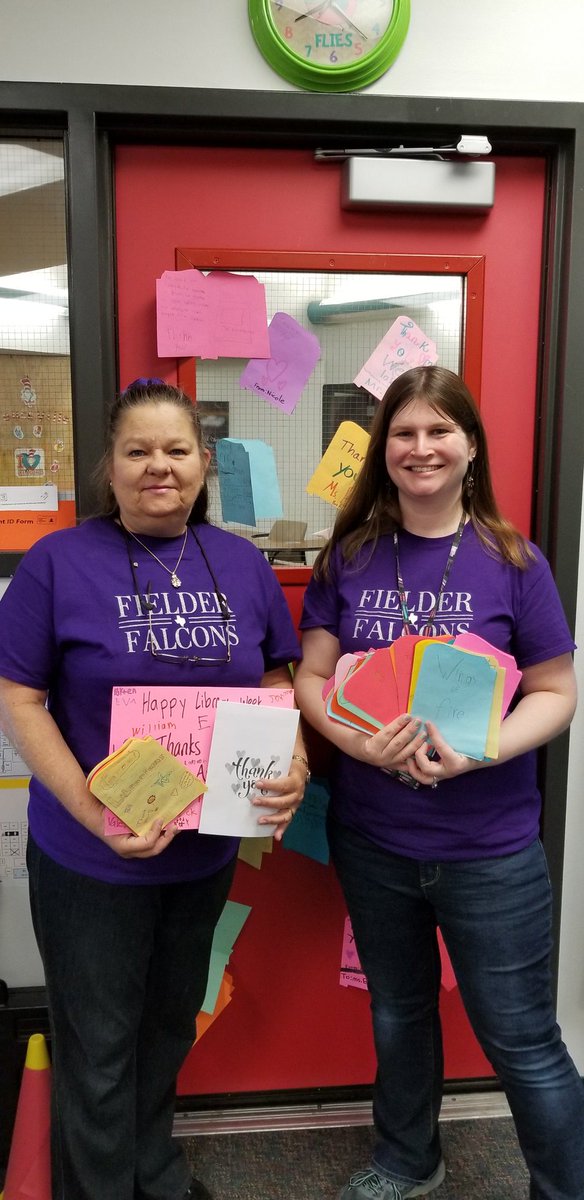 Ms. Bustamante and I are lucky to work at such an amazing school as @FielderElem! For #nationallibrarymonth we were showered with kind words, a video, and stories from students, along with treats and these amazing shirts.  #FielderPride #katylibrarians