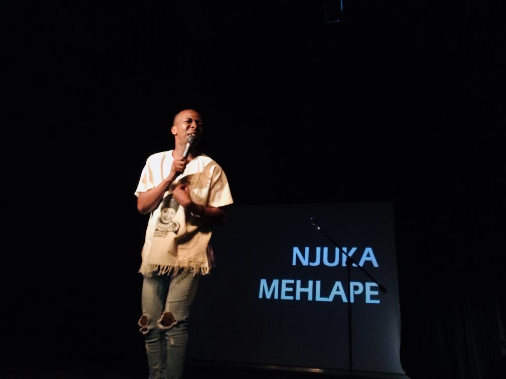 UJArts_Culture's tweet photo. Next up is one of UJ's very own students, @NjukaTheComic  live for the first time on the #OutTheBoxComedy stage &amp; the crowd is impressed with his Nelson Mandela impersonation.
@Goliath_Goliath  @POPArtJHB https://t.co/yxpsRxpGOq