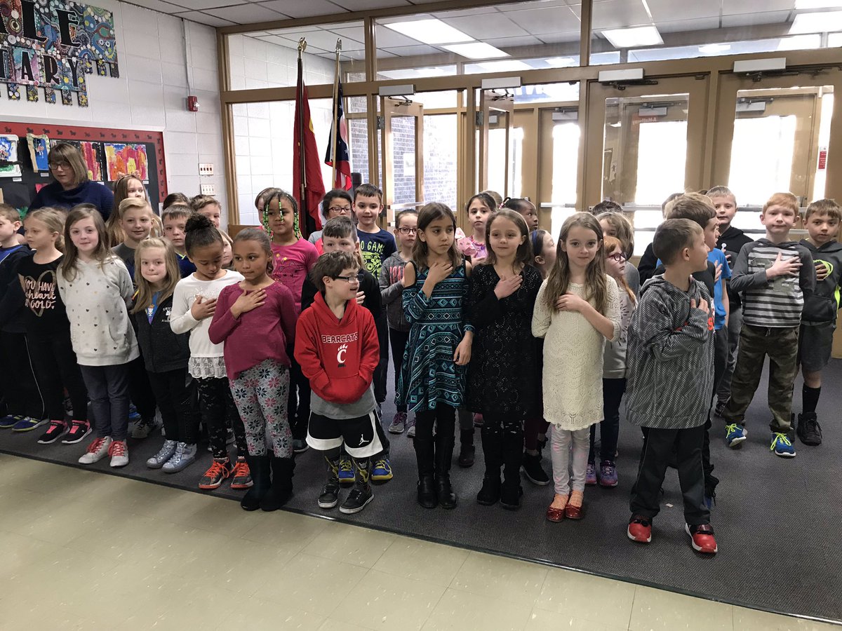 PrincipalWinkle's tweet photo. Local 12 is on campus hearing all about the great things are kids are doing! Check us out live tomorrow at 6:30AM for School of the Week! Here are our some of our first graders saying the Pledge of Allegiance for them! @OHLSD Go Scotties! @page_m1 https://t.co/dSD3di1Z9E