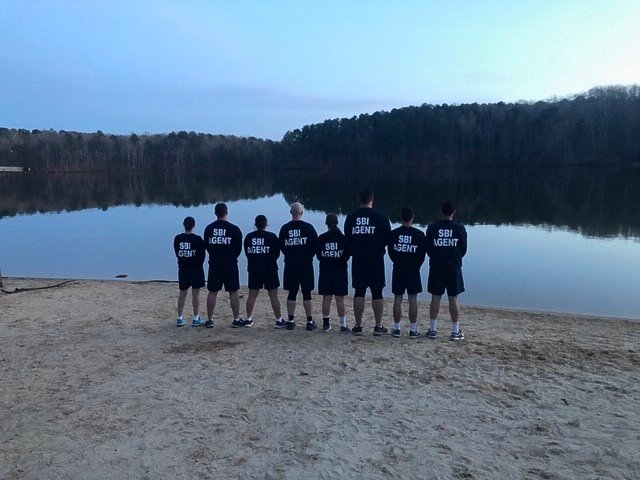 SBI1937's tweet photo. Nothing like a 3-mile run around Lake Johnson for the 49th Academy of #NCSBI recruits before the sun goes down. To learn more about a career with the #SBI, check out our website... https://t.co/2tft34Nq9T https://t.co/irjJKOgoB4