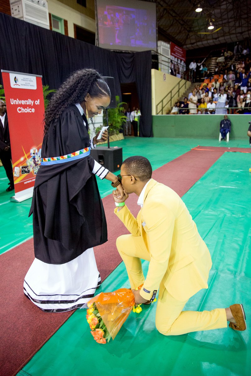 UKZN's tweet photo. @UKZN Graduation - Inspiring Romance: Bachelor of Education graduate Ngcebo Zungu was swept off her feet by her partner and fellow student, Phinda Fikeni who surprised her with a bouquet of roses at a graduation ceremony held on the Westville campus last night, 02 April 2019. https://t.co/FXO4sBoIGz