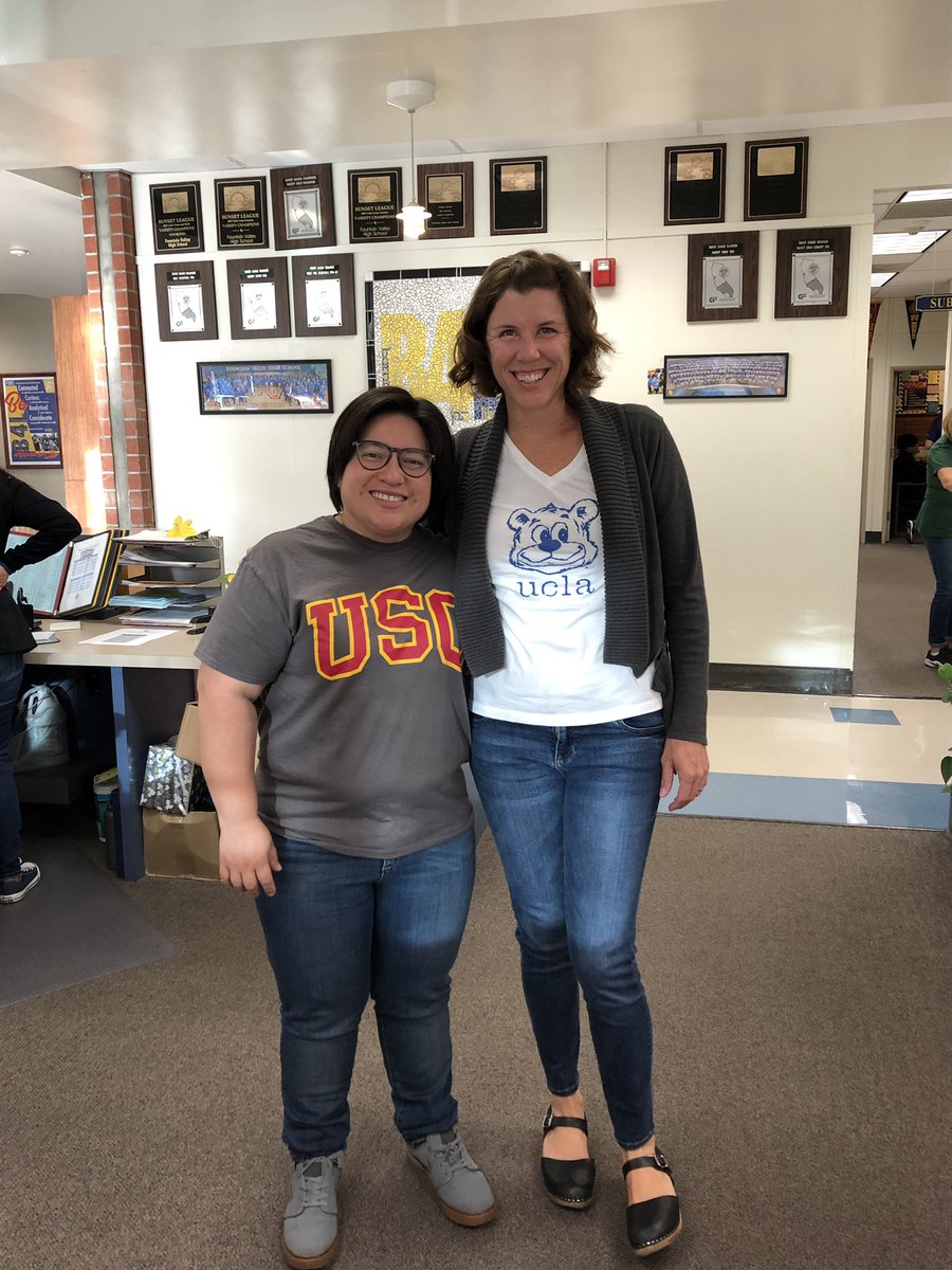 Happiness is loving your coworkers even if they went to SC! #collegewearwednesdays