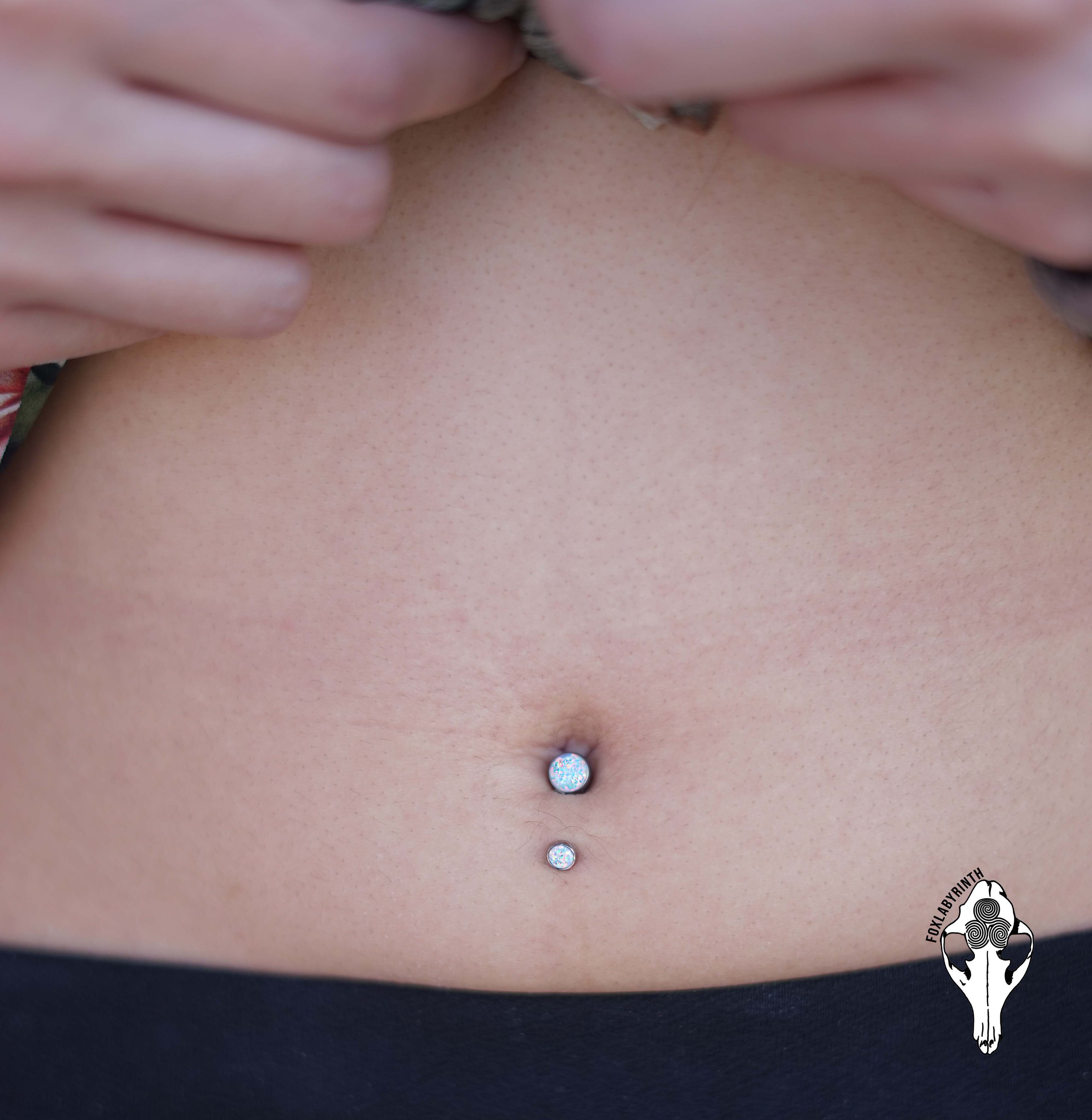 Lower store belly piercing