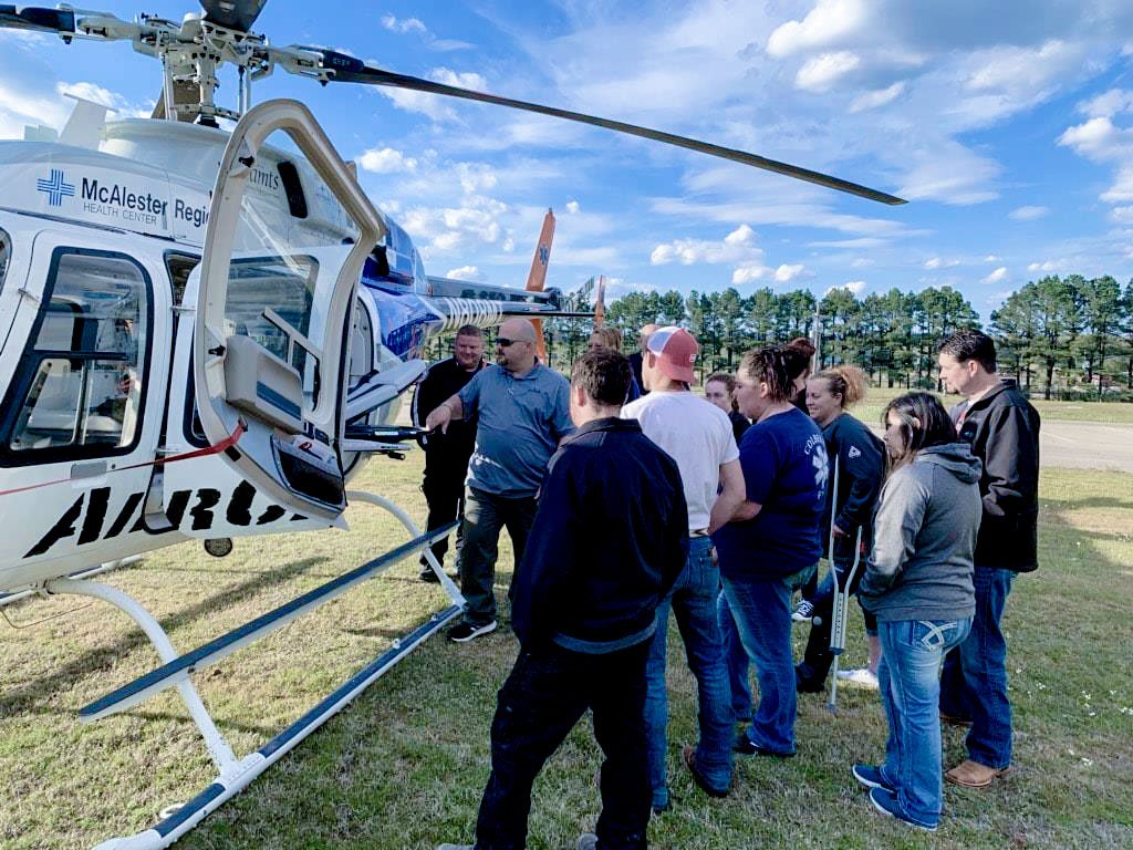 MedTransCorp's tweet photo. McAlester Regional AirCare teaching next generation of EMT's from KTC in Atoka about landing zone safety and patient transport preparation.
#LandingZone #aviationlovers #learntofly #aMedTransPartner https://t.co/LPpJBtZ1fP