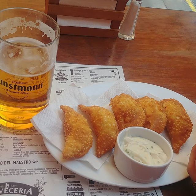 everydaynomads's tweet photo. Beer &amp; Empanadas! 
#beer #cerveza #empanadas #cheese #queso #santiago #chile# southamerica #happydays https://t.co/50xRBOuUvy https://t.co/yY5NJaH0n3