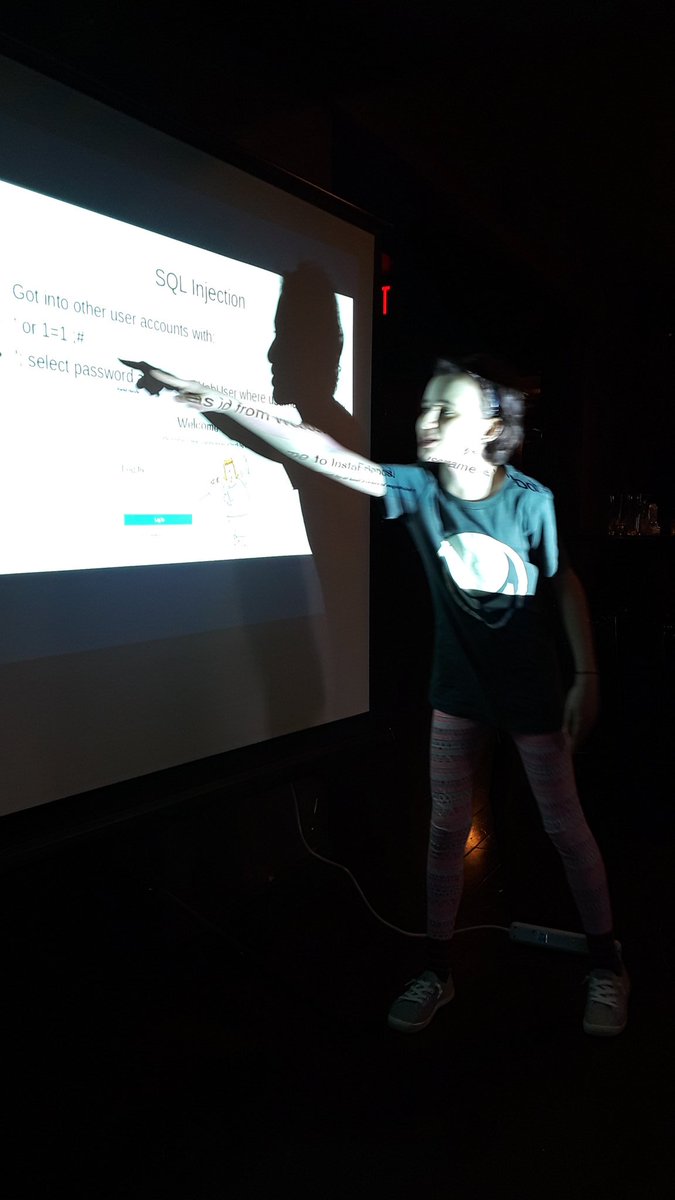 BiaSciLab's tweet photo. Explaining the SQL injections and other hacks I did for the @SecInnovation March Hackness CTF to @DEFCON610 tonight!

Rocking my @DemonSaw_Nation shirt from Defcon 23 😁🤘
#hacking #STEM https://t.co/t4V9pG3oIw
