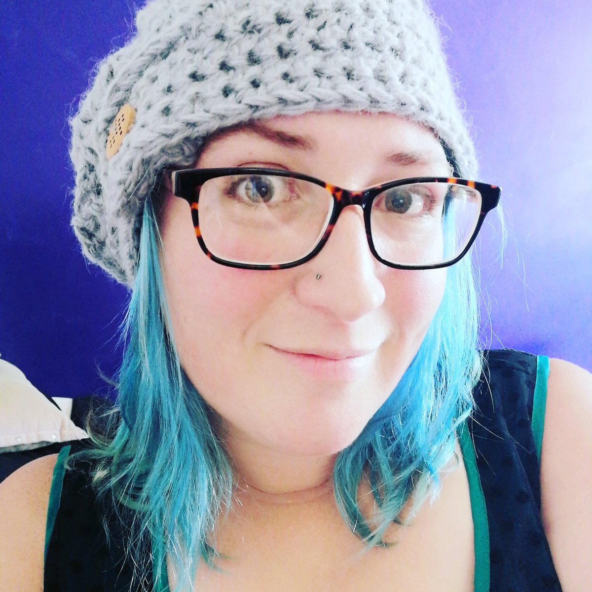 CassieHartNZ's tweet photo. When an awesome fan makes you an awesome hat, and it's so snuggly, and the day is hot but you can't stop wearing it because you love it so much. Thank you! #writerslife #bestfan #setforwinter #grateful https://t.co/eIKzBTegeB