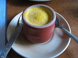 #Kulfi or Qulfi is a Hindustani word derived from the #Persian Qufli (Arabic Origin) meaning 'covered cup'. The dessert likely originated in the #Mughal Empire in the 16th century #India . The mixture of dense evaporated milk , often described as 'traditional Indian #icecream.