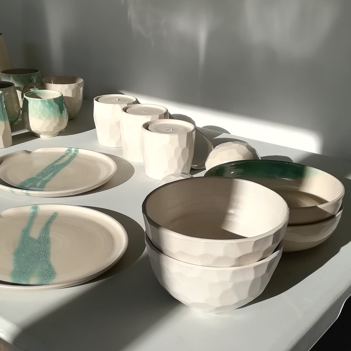 Pots in the morning light waiting to be wrapped up and taken to the <a href="/anglianpotters/">Anglian Potters</a> #Undercroft Exhibition in #norwich. It opens this Saturday at 10am. I'll be invigilating on Sunday if you'd like to come along. It would be great to see you!