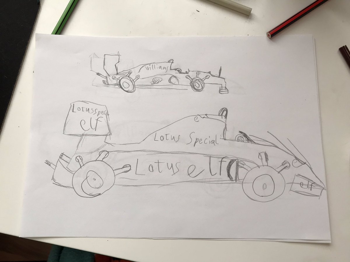 Pencil drawing of 2 classic formula one cars by my 8 year old son.