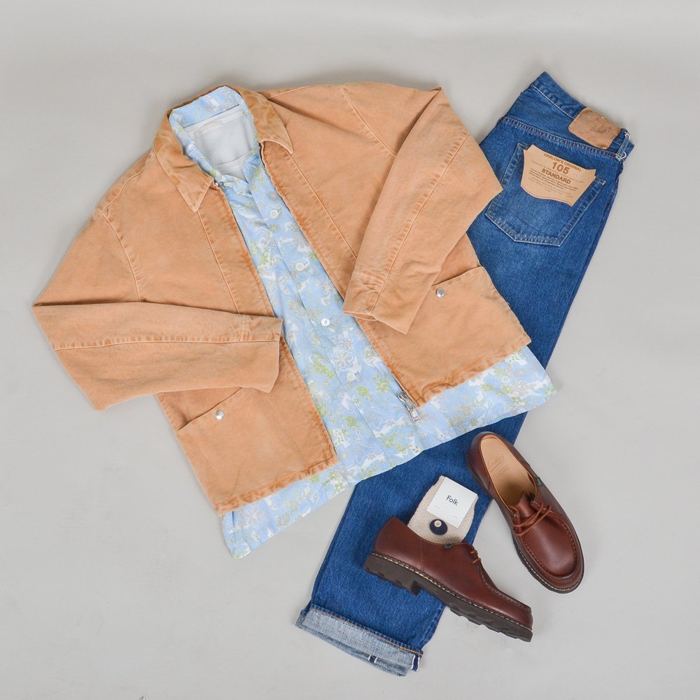 Looking to liven up an outfit? Add a colour pop or pattern! We've layered the Our Legacy Box Short Sleeve Shirt with the Moleskin Jacket | Styled with classics from Orslow and Paraboot.  Shop the look in store and online at liquorstoreclothing.com.