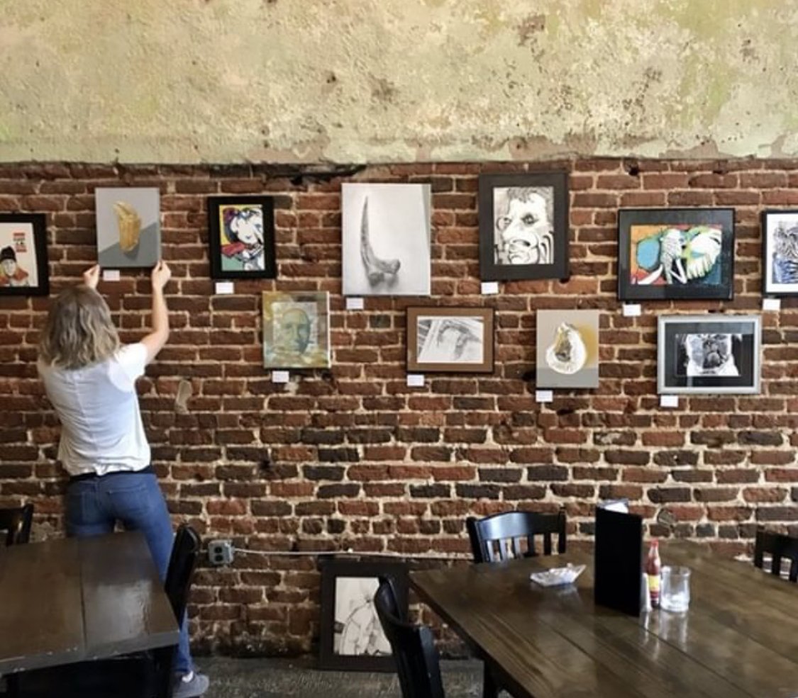 BigEasyNC's tweet photo. Our First Friday artist Rachel Kosbab has finished hanging her amazing pieces! She will be here this Friday, April 5, from 6-9pm for a meet and greet! If you can’t come by then, no worries, her pieces will be up for the entire month of April. #bigeasync #firstfridayraleigh https://t.co/P0gO1zfpMe