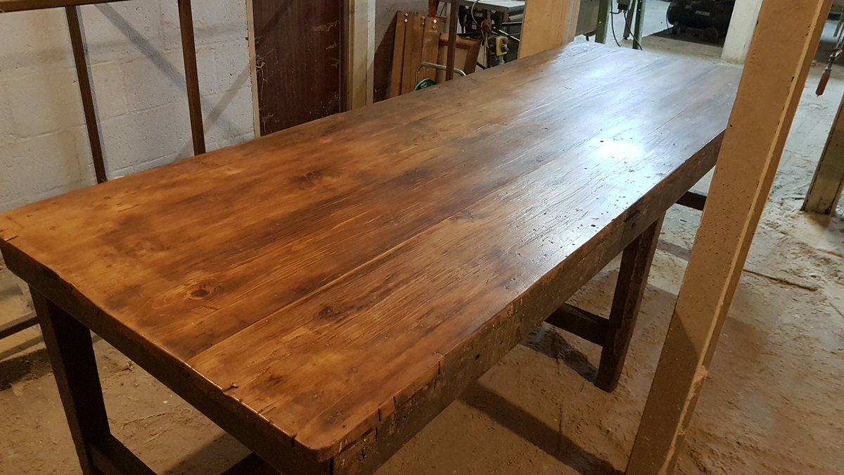 Reclaimed2's tweet image. 9ft workbench bought to me with a ply top, ply ripped off to reveal oil stained, paint covered pine top. Frame tightened and stretcher repaired, top stripped back and finished with a rustic pine wax, available now #tablerenovation