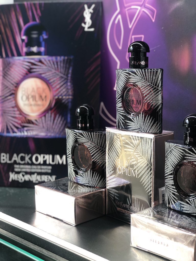 PerfumeShopl1's tweet photo. Blocking out the April showers here in Liverpool ☔️ and letting the new Black Opium Limited Edition bottle give us summer vibes 🌴💜 @TPSPeople https://t.co/dtjyF3ECSz
