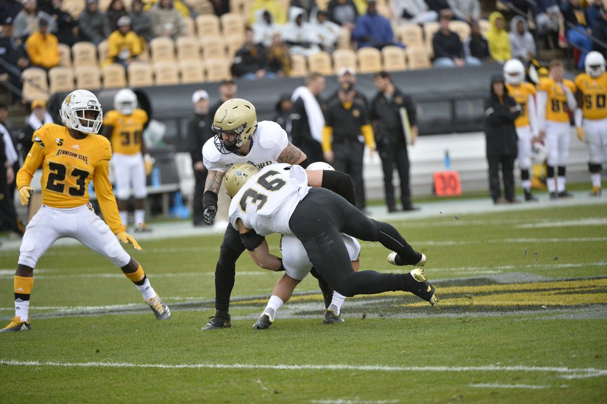 Wofford_FB_EQ's tweet photo. #ThrowbackThursday pt 2 Superman Wes Rountree, Power like a locomotive. Always a fan of the 1 arm sleeve #timelessdrip #WoffordFootballDrip https://t.co/4sCQRDYyqr