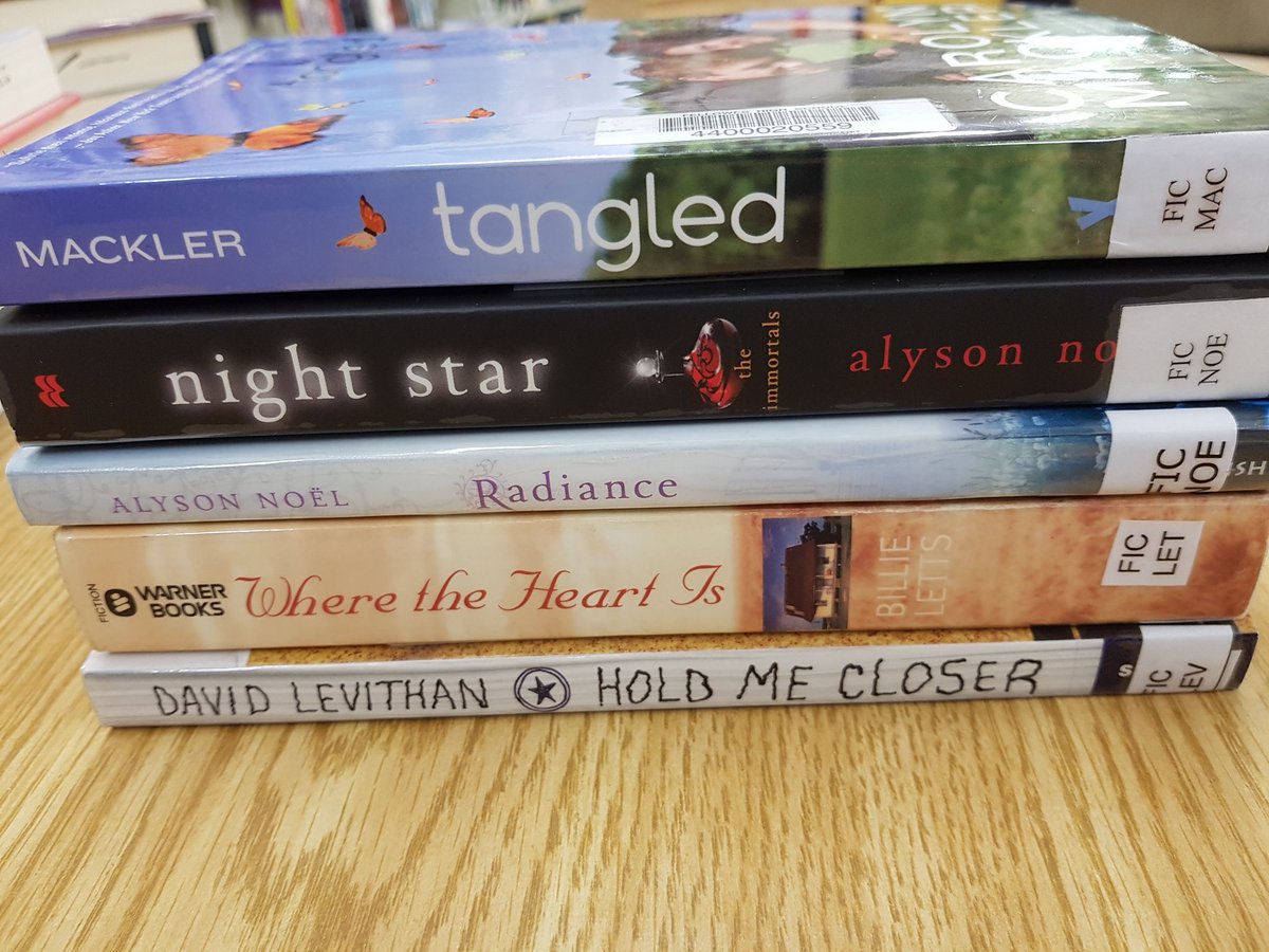 EFKraftchick's tweet photo. Some of the #BookSpinePoetry created by my English group, which we will be displaying in our @FellowesHighSch library for #PoetryMonth. This could work well for many grade levels, and be completed individually or collaboratively. #CallingAllPoets @RCDSB https://t.co/vQj6JJTLEV