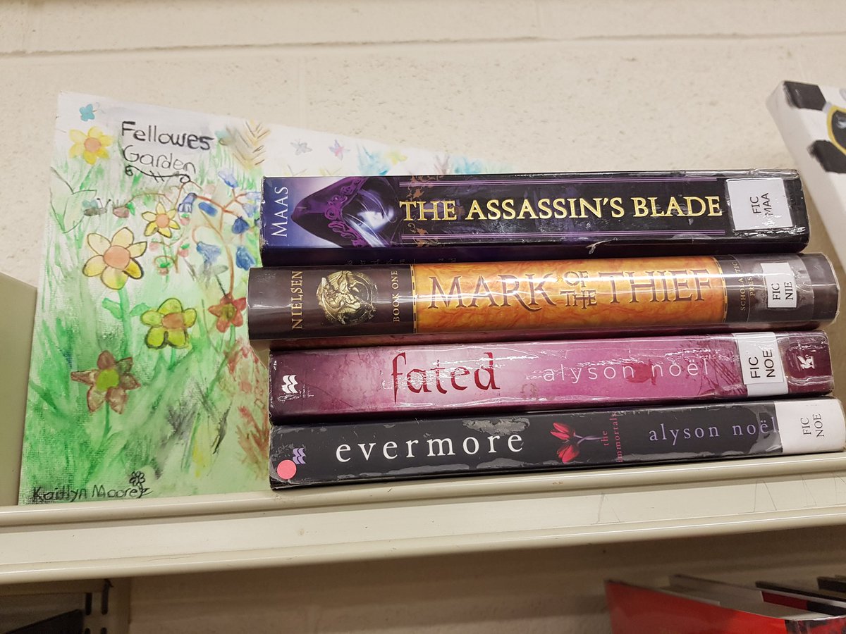 EFKraftchick's tweet photo. Some of the #BookSpinePoetry created by my English group, which we will be displaying in our @FellowesHighSch library for #PoetryMonth. This could work well for many grade levels, and be completed individually or collaboratively. #CallingAllPoets @RCDSB https://t.co/vQj6JJTLEV