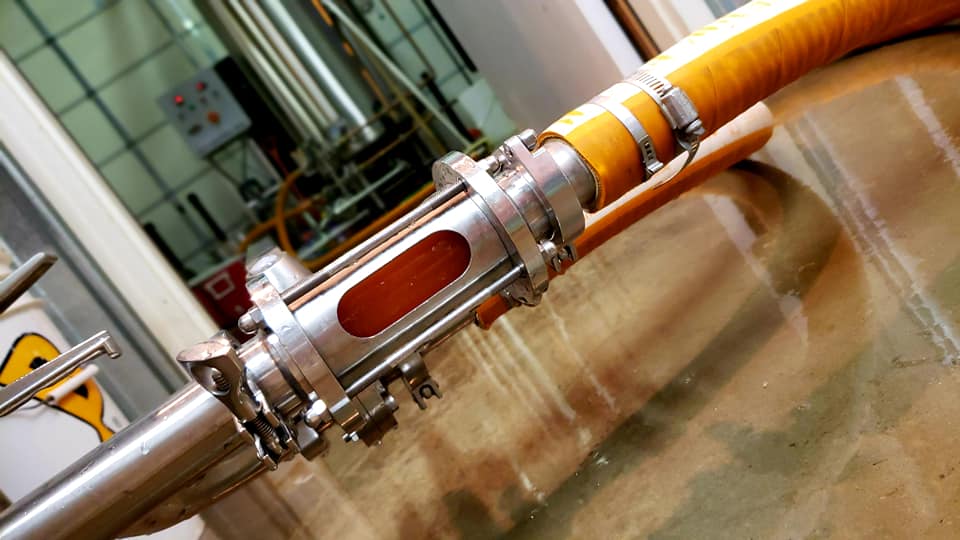 Nebraska Strong Red Ale is happily chugging away in the fermenter. #SudsforFloods