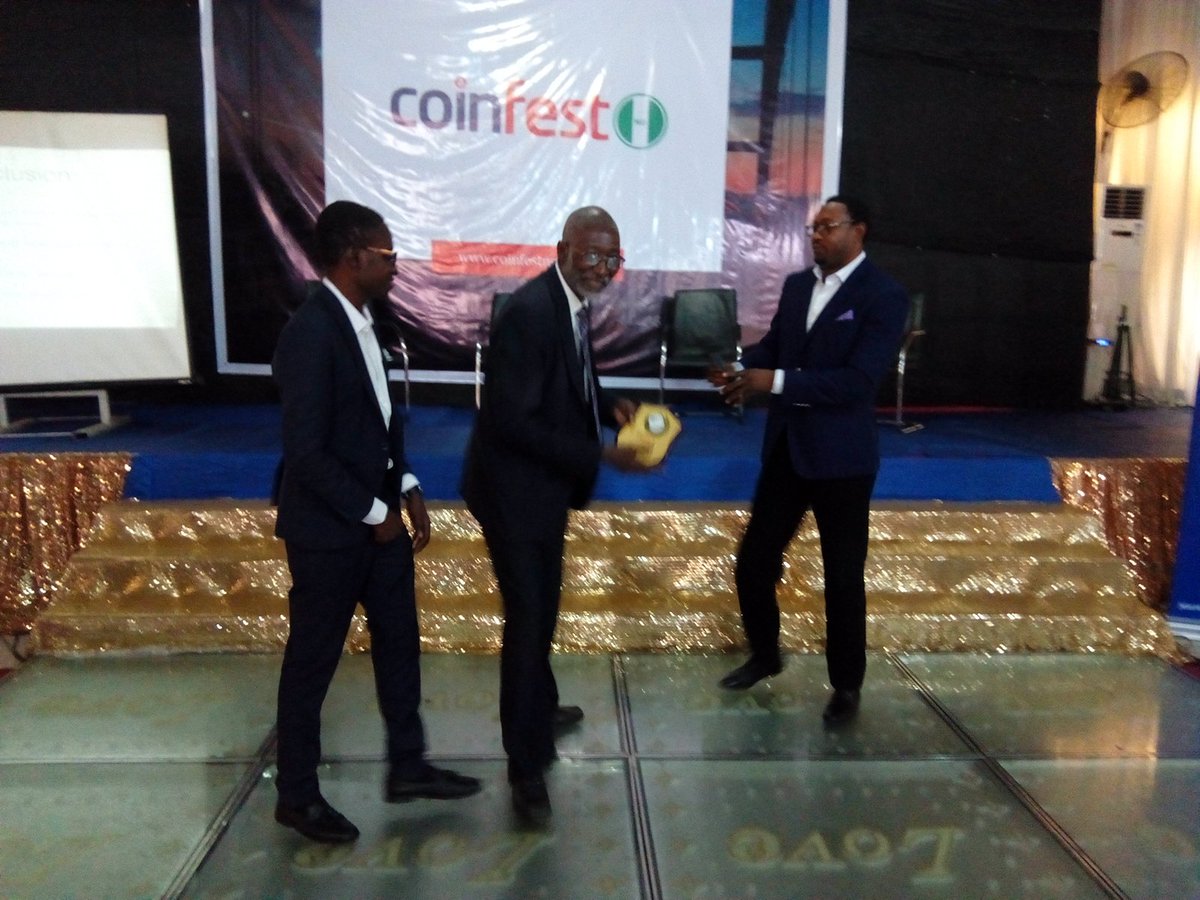 ledeesolomon's tweet photo. An award of recognition presented to #CoinFestNG 2019 keynote speaker Professor Nii Quaynor for his immense contribution in the Africa Blockchain ecosystem. #CoinFest #CoinFest2019 https://t.co/f4kNoJ1akO https://t.co/AwXxSVmmd4