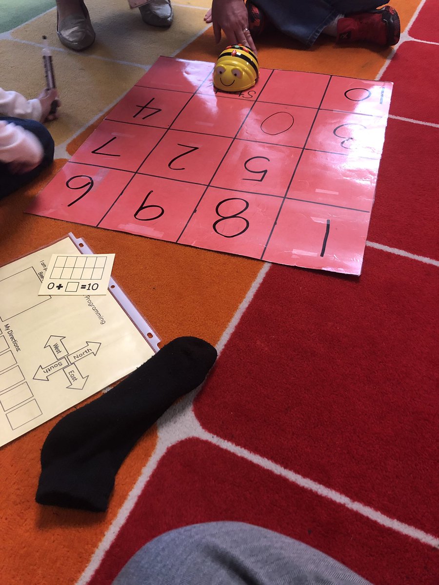 Kindergarteners using robots to add. #k5engineers