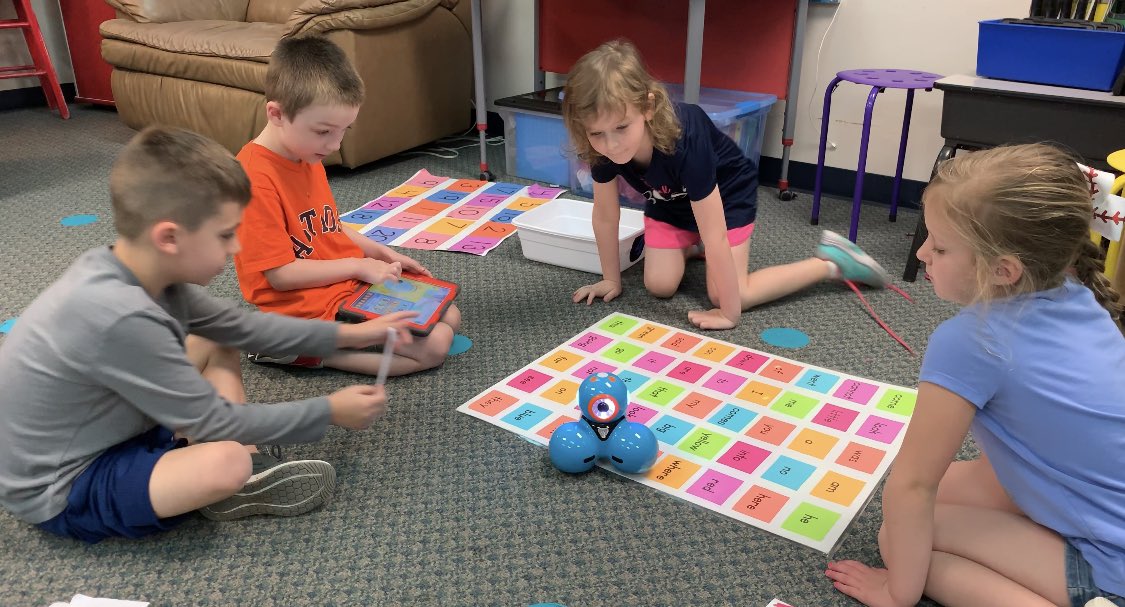 JennGRoach's tweet image. These students are coding robots to find the sight word. @mrsadudley #CodingInKinder #TxEd