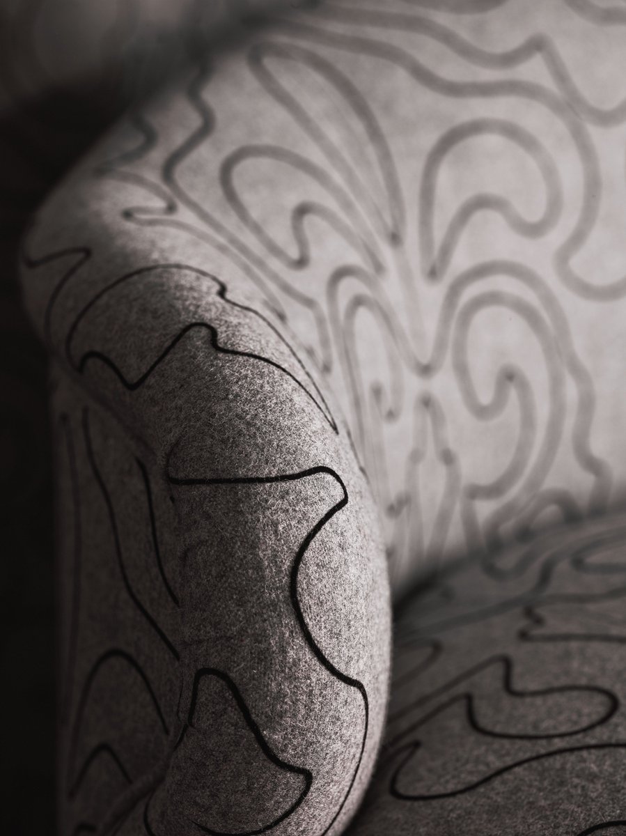 A modern twist on a classic design, a flock outline depicts the silhouette of a large-scale contemporary damask on tactile wool. #zinctextile #interior #design #luxury #wool #flock #theromogroup