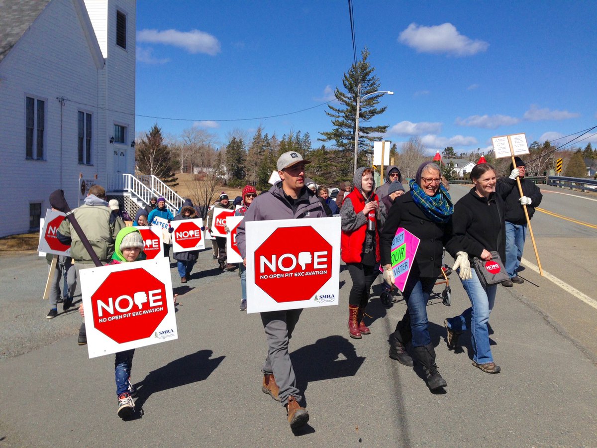 EACwilderness's tweet photo. Happening right now. Over 50 protestors at opening of Atlantic Gold's new "community relations" office in Sherbrooke, #NovaScotia. The community is speaking: No open pit gold mine next to St. Mary's River! NOPE! 👎
#nspoli #cdnpoli https://t.co/q1hDCgZue3