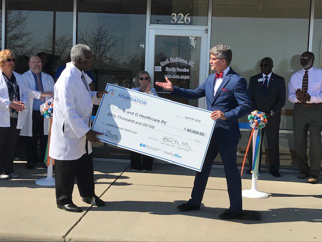NCMedSoc's tweet photo. NCMS was thrilled to be in Whiteville, NC today to present G &amp; G Healthcare with a check for $60,000 from the NCMS Foundation’s #DisasterReliefFund and to celebrate the practice's grand reopening after being devastated by #HurricaneFlorence. @PhysiciansFound @BCBSNCFound https://t.co/49ATdQzEQr