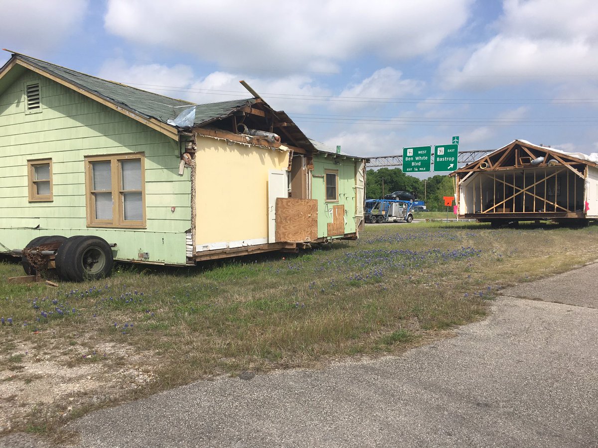 AdamH_TxDOT's tweet photo. For a week now I've driven by these houses just sitting here off 183/71. One seems to be a church with an organ inside... today my goal is to figure out what in the name of @StuckHouseATX is going on here. https://t.co/eIT7J4UQiA