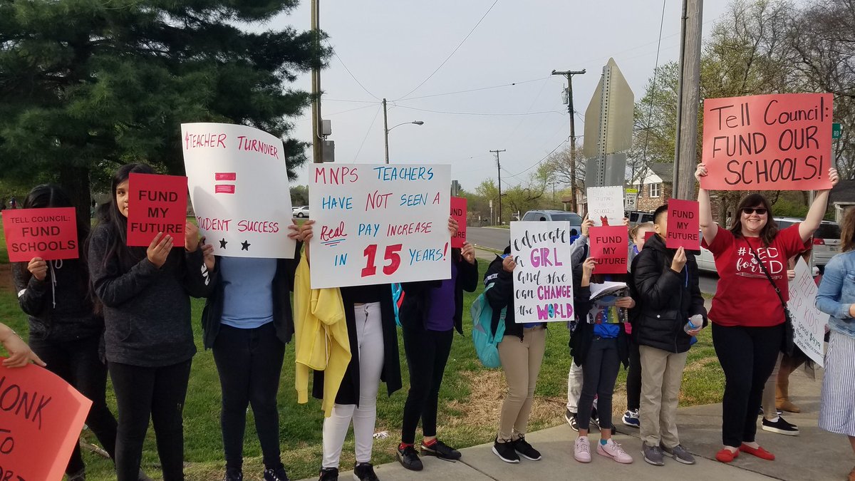 MrsBNashville's tweet photo. We were back at it this morning at @ApolloMiddle for Day 2 of Walk-ins. This time joined by ardently activated student citizens who came with their own signage! @Red4edN #Red4EdTN #ItCitySchools #FundMNPS #publicschoolkids @MayorBriley @votevercher @mendesbob @MetroNashville https://t.co/SGUp9mVQER