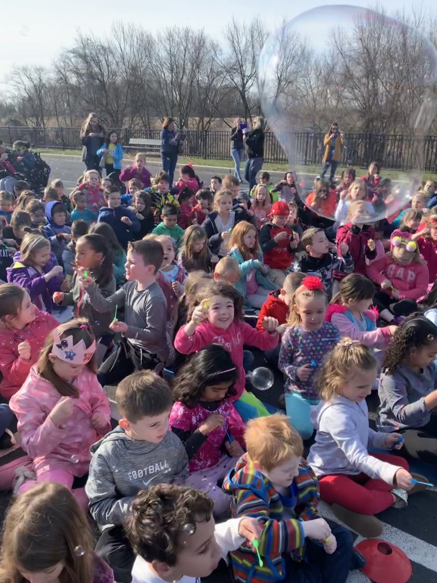 Blowing bubbles for autism awareness🧩