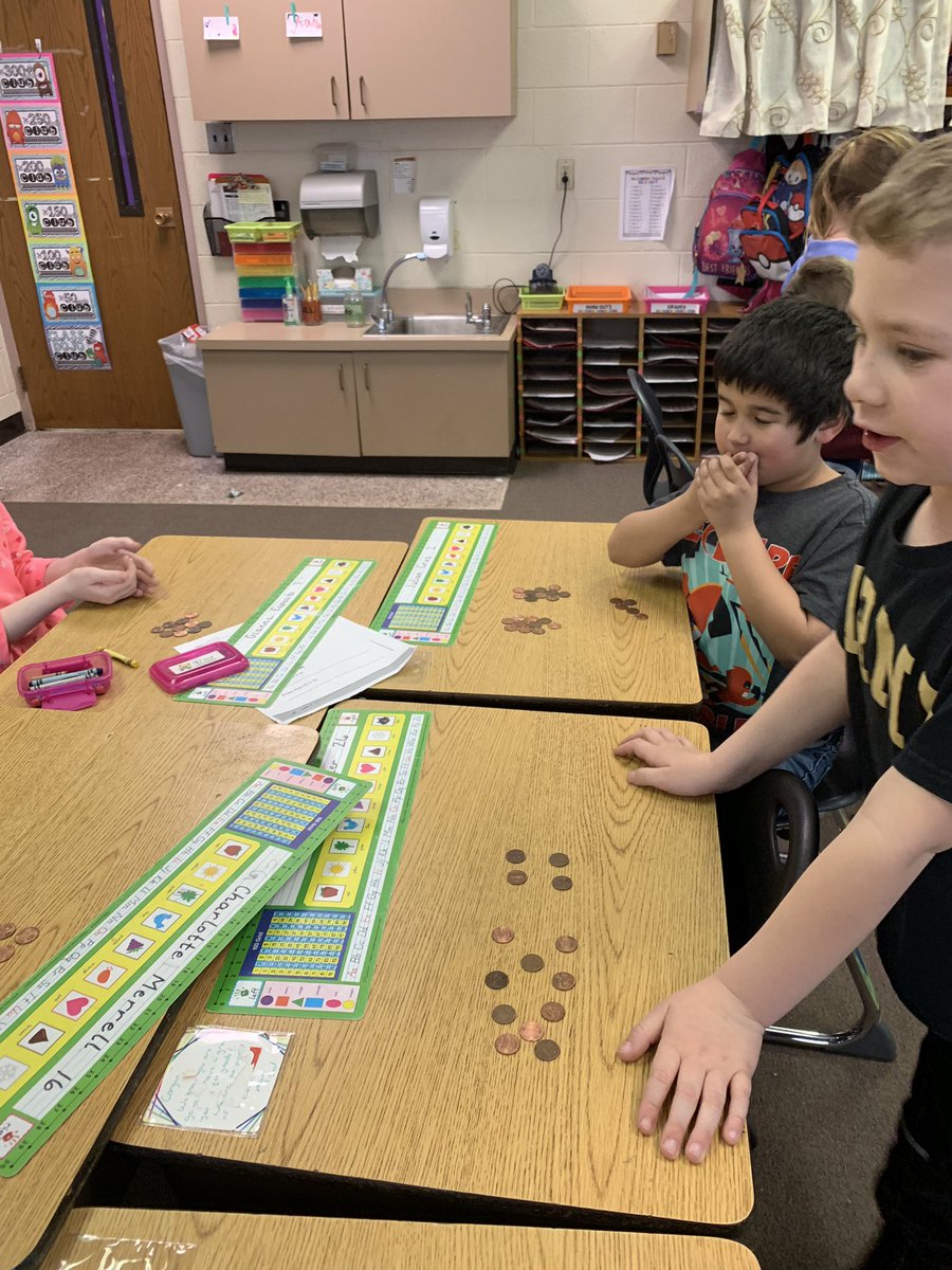 We are sorting coins and counting up groups of 10 pennies to count our coin wars money! We are happy to support Feed My Starving Children and practice coins. <a href="/JimLangBGCS/">Jim Lang</a>