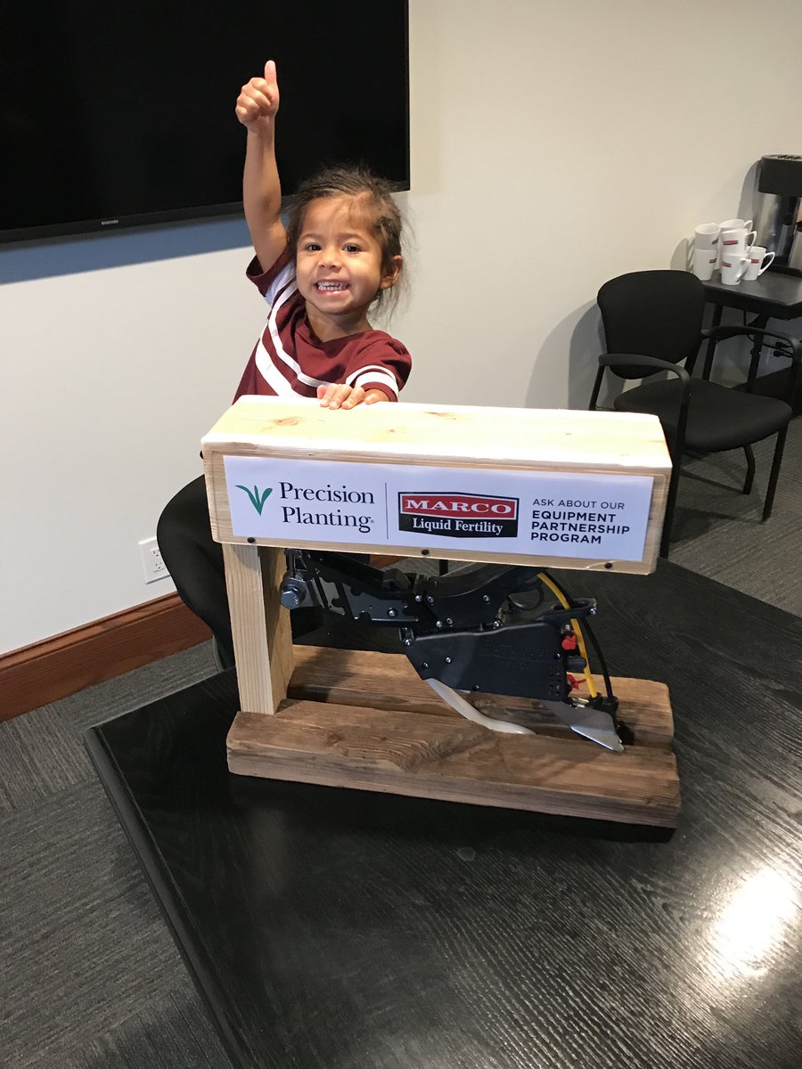 mhowie64's tweet photo. Tatiana gives Marco’s new dealer display a thumbs up.  Our youngest fan?  👍🏻 ❤️. #liquidfertilizer #QuickGrow #PrecisionPlanting https://t.co/GQYWvlX6cE