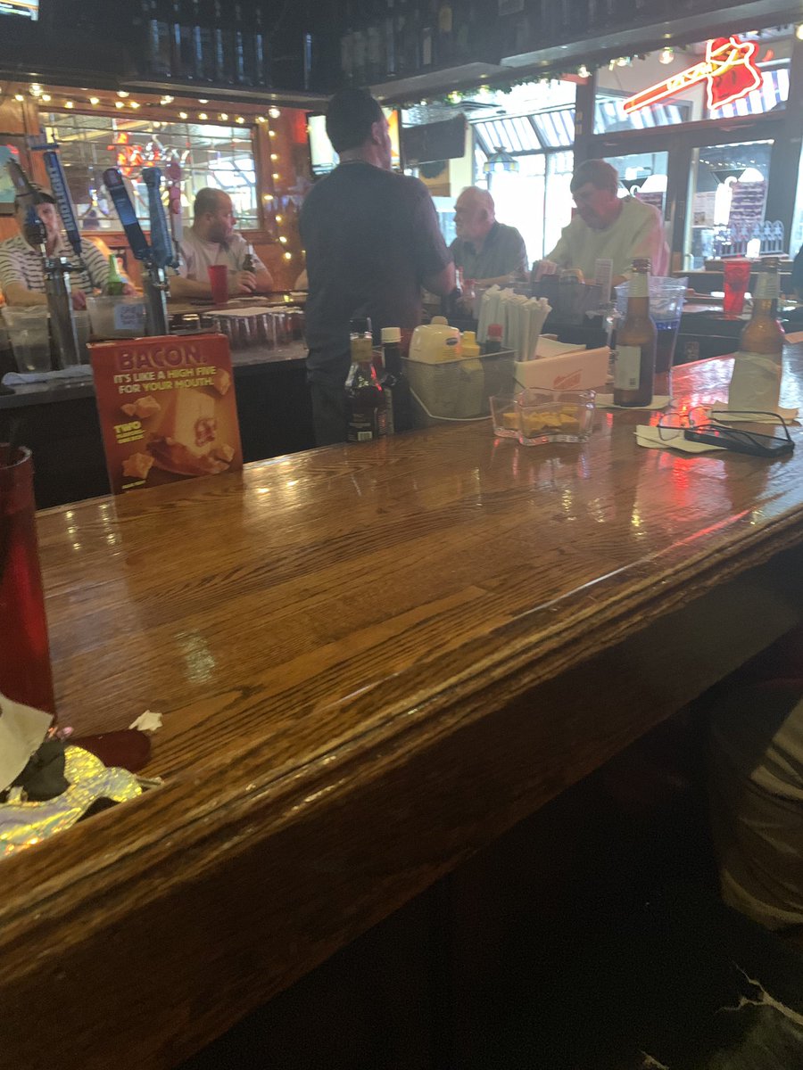 ASipOf_Mocha's tweet photo. Remember I told y’all Blue Ribbon Grill felt like a “no coloreds allowed” establishment. This is just half the bar. See what I mean? 😩 https://t.co/oy4r2Td2tA