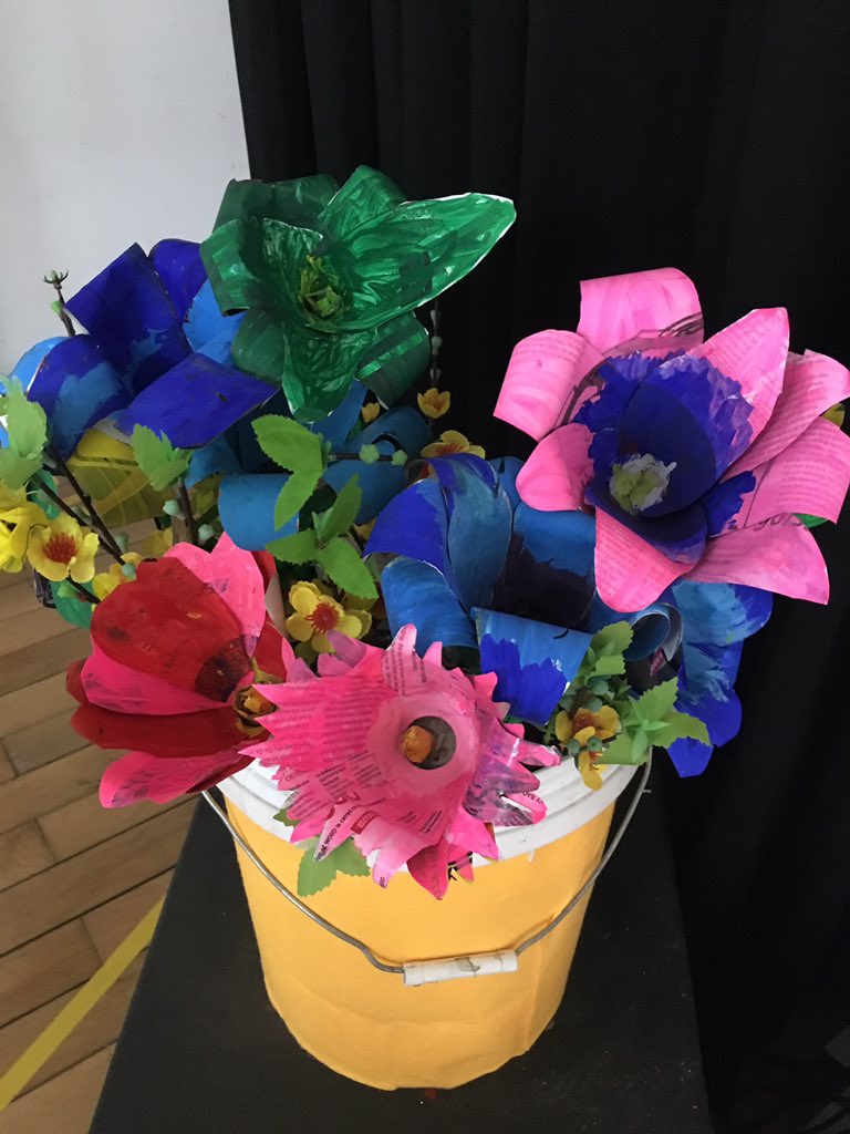 ArtTeacherEmma's tweet photo. The Grade 2 sustainability flowers made from upcycled materials inspired by #Strawpocalypse #zerowastesaigon ready to go for presentation at the music show ‘Our Earth Festival’ with @MsJenniShine @AnhNguy73062852 #artandmusiccollaboration @ISSPVN #isspcelebrates #CognitaWay https://t.co/4hvVtjfcEN