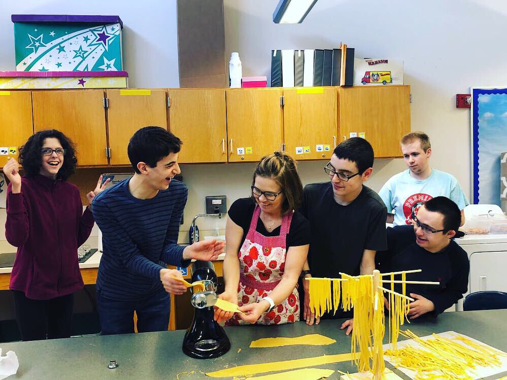 HollistonHigh's tweet photo. Me. Connoni teaching some of our students how to make pasta today!  We are all jealous. #studentswhocook #yumyum #hollistoninnovates #amilliondreams https://t.co/v3SKVwzXO3